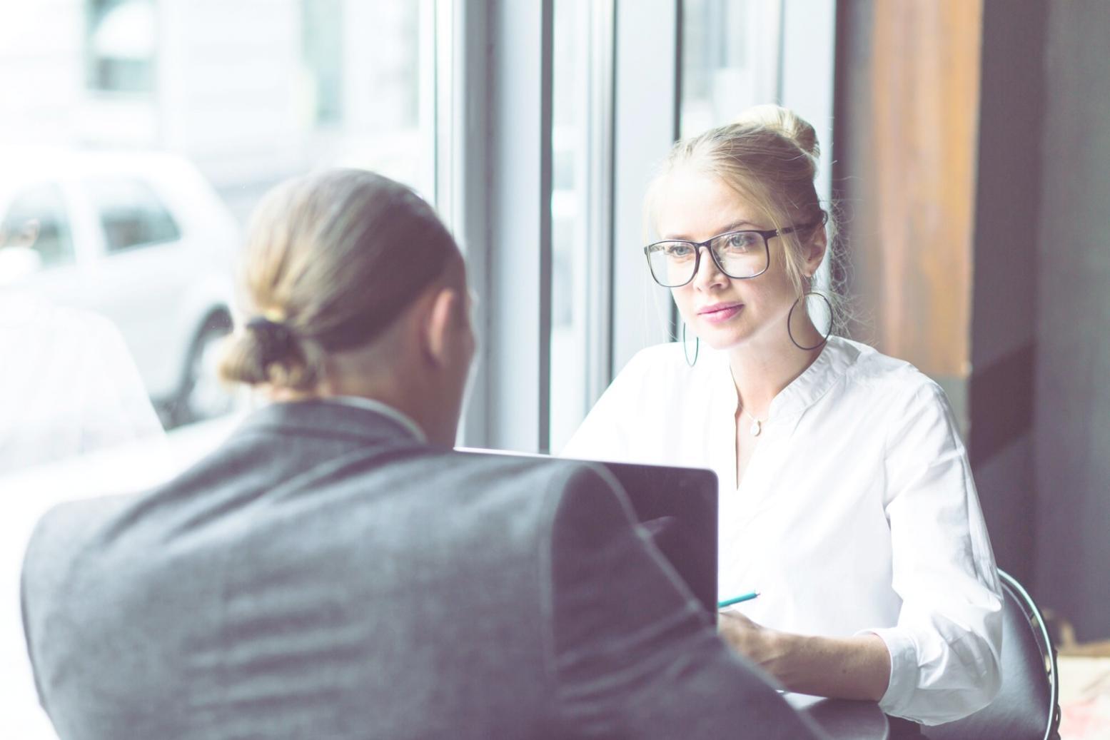 Business professionals reviewing financial communication strategies