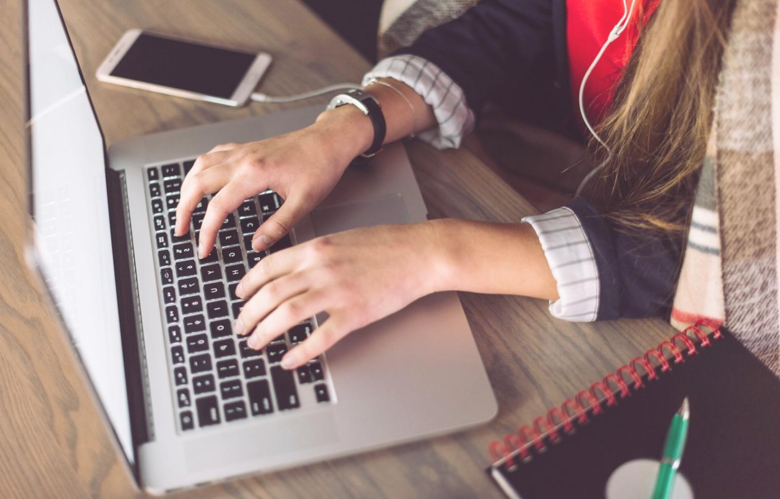Students practicing business communication techniques in collaborative setting